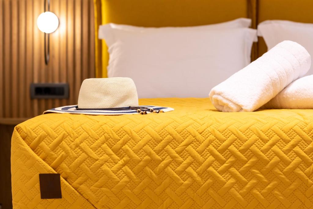 Posteľ alebo postele v izbe v ubytovaní Bella Vasilica Luxury Apartments