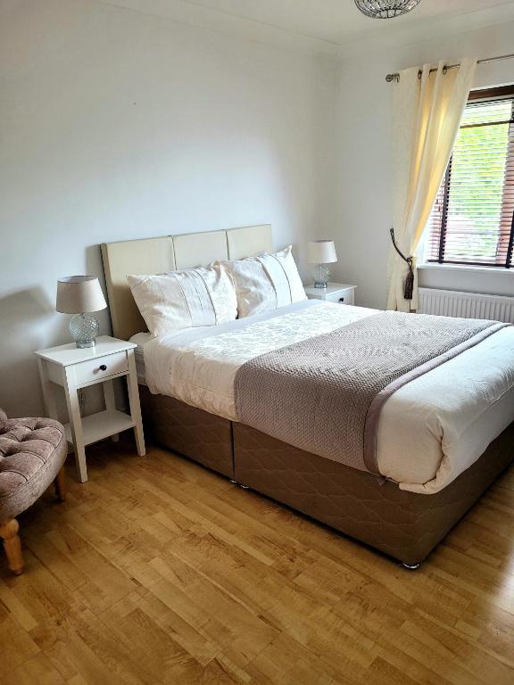 Postel nebo postele na pokoji v ubytování Grange House B&B