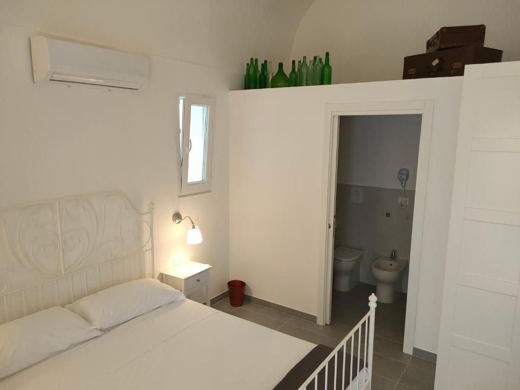 Postel nebo postele na pokoji v ubytování Borgottocento