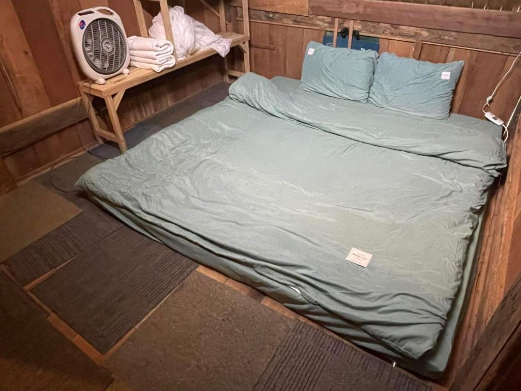 Voodi või voodid majutusasutuse Tiệm Cà Phê Mer Homestay & Coffee Mộc Châu toas