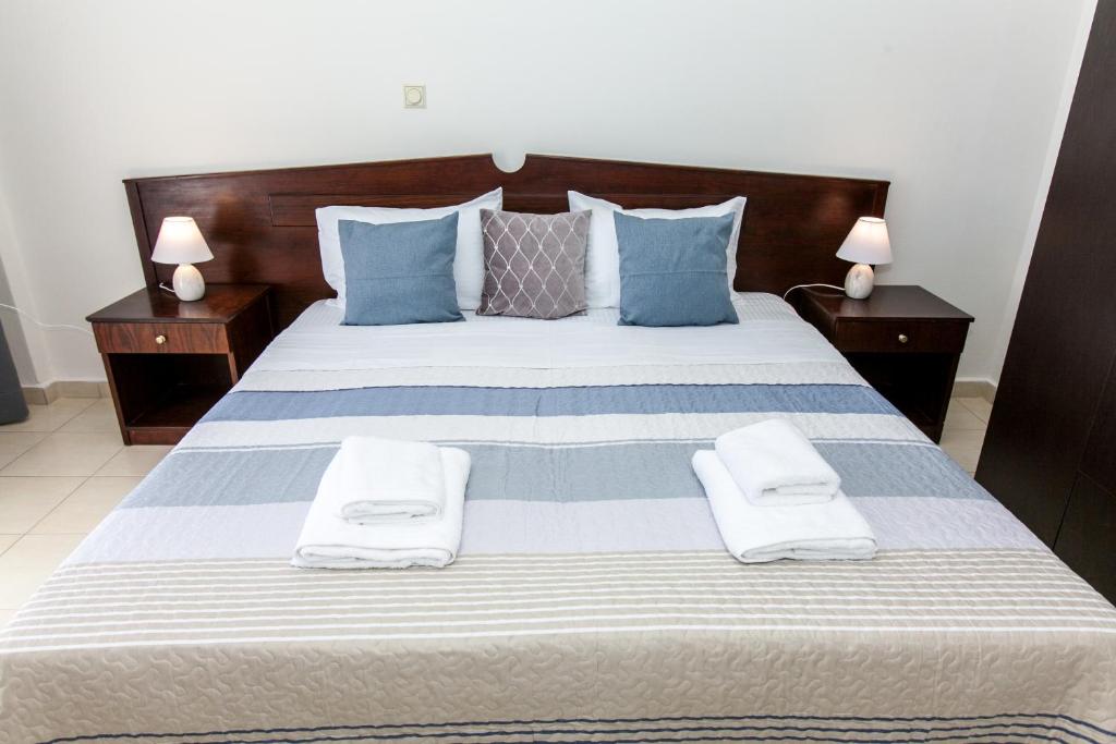 Postel nebo postele na pokoji v ubytování Hotel Thetis