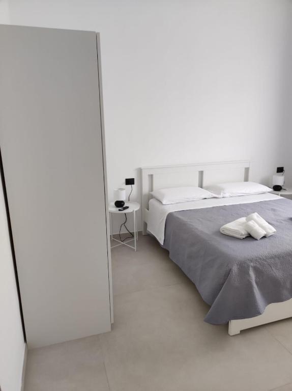 Postel nebo postele na pokoji v ubytování Villa Rita Apartament & Rooms