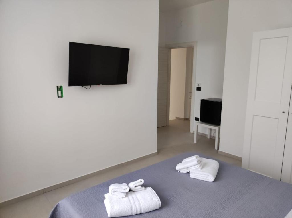 TV a/nebo společenská místnost v ubytování Villa Rita Apartament & Rooms