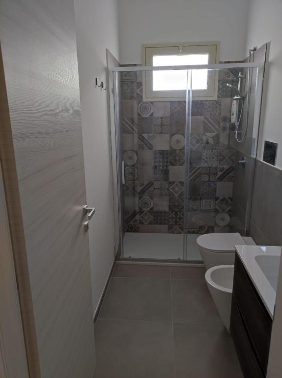 Koupelna v ubytování Villa Rita Apartament & Rooms