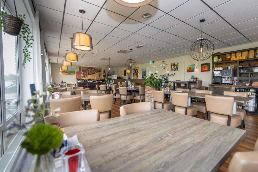 Um restaurante ou outro lugar para comer em Hotel B&B d'Olde Smidse