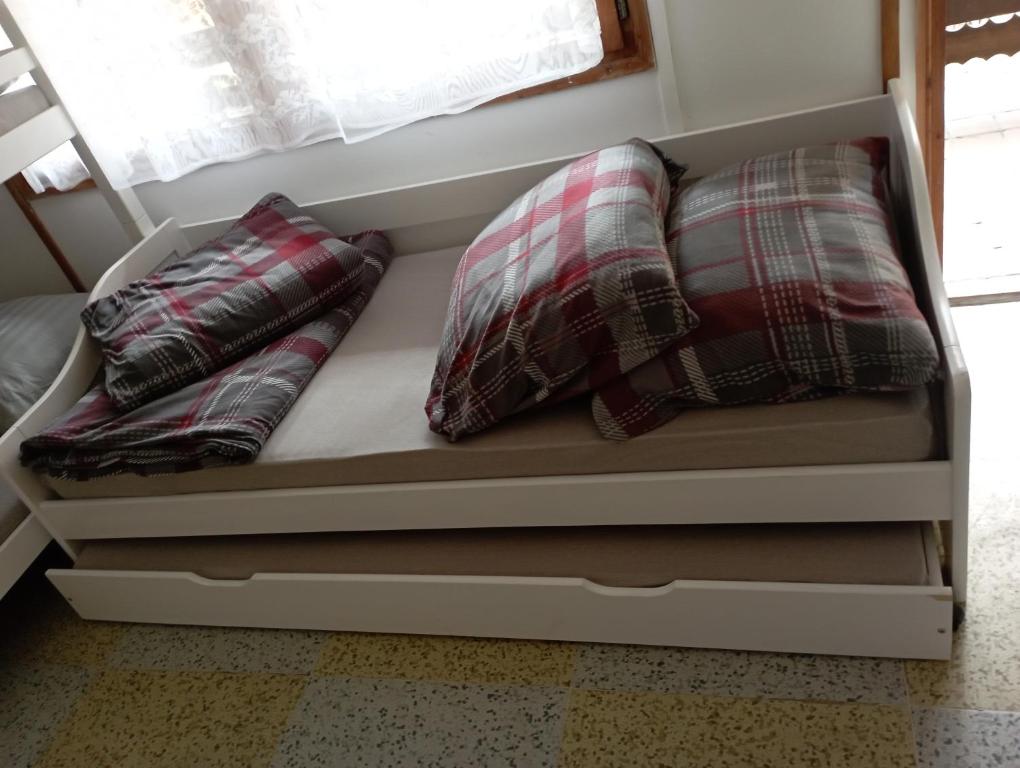 Postel nebo postele na pokoji v ubytování Chatka Andělka