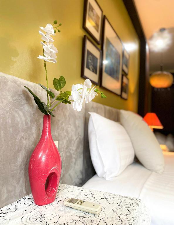 Postel nebo postele na pokoji v ubytování Art Hotel Ha Noi