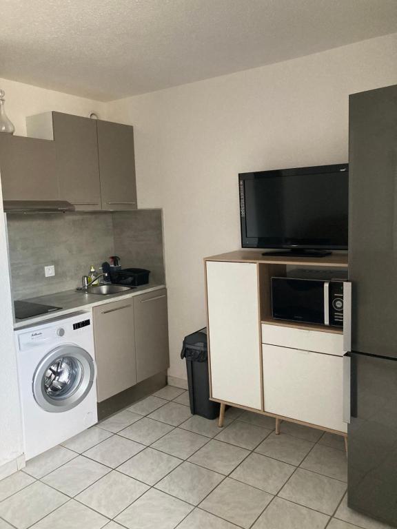 Kuchyňa alebo kuchynka v ubytovaní Port-Leucate, studio 3 personnes