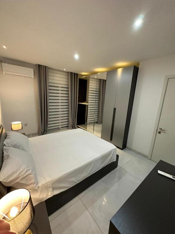 Postel nebo postele na pokoji v ubytování ONE100 apartments