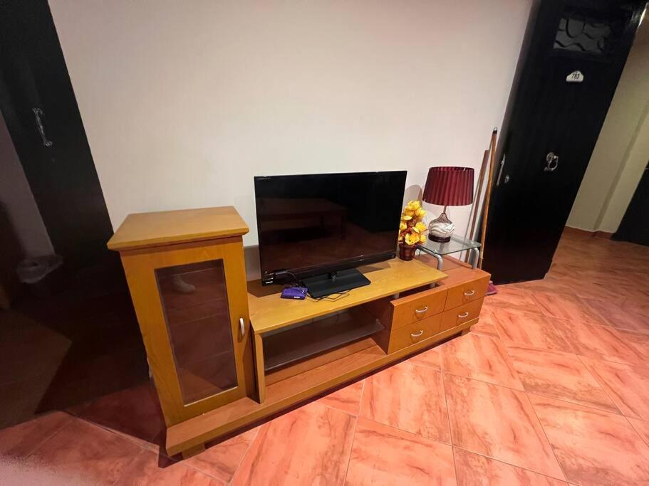 A television and/or entertainment centre at بورتو مارينا الساحل الشمالى