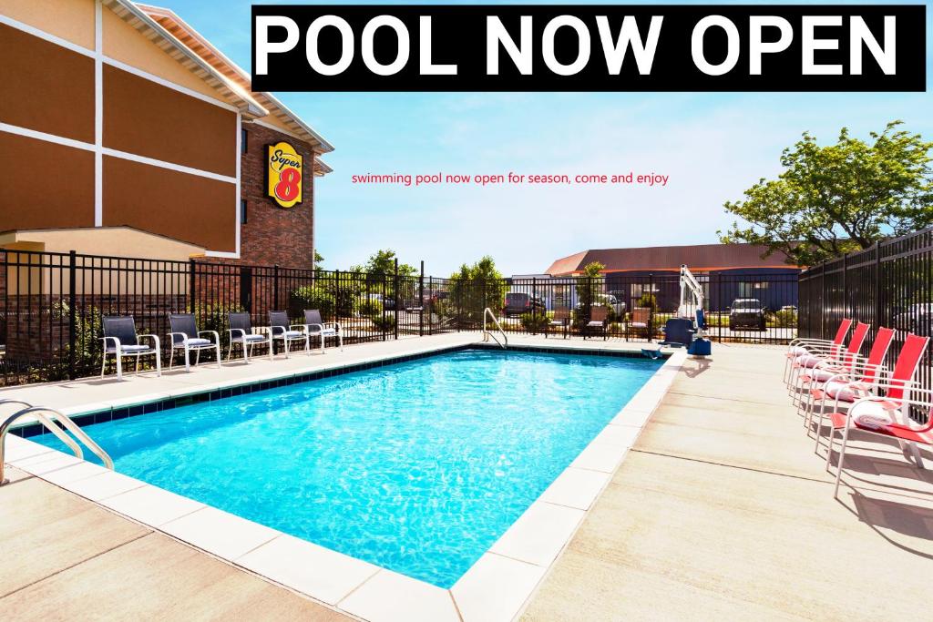 a swimming pool now open at a hotel at Super 8 by Wyndham Lenexa Overland Park Area/Mall Area in Lenexa