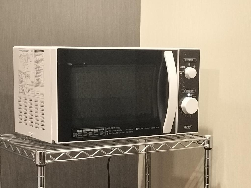 TV a/nebo společenská místnost v ubytování The Royal Park Canvas Nagoya
