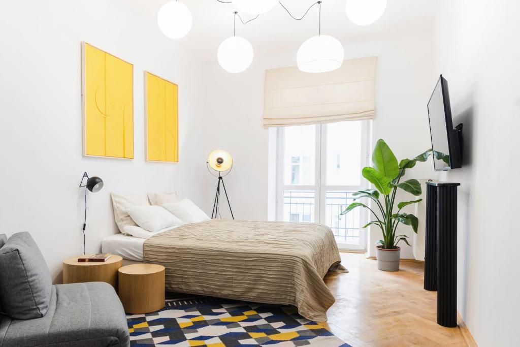 Televízia a/alebo spoločenská miestnosť v ubytovaní Warsaw Concierge Koneser