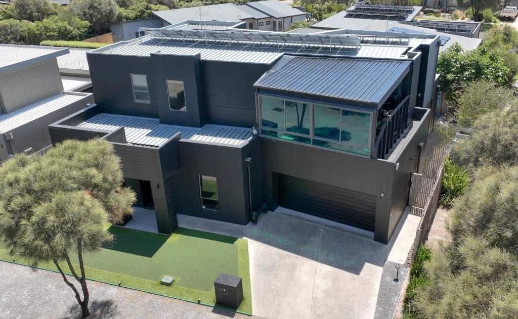 an aerial view of a house with a roof at 4CHP The Sands in Torquay
