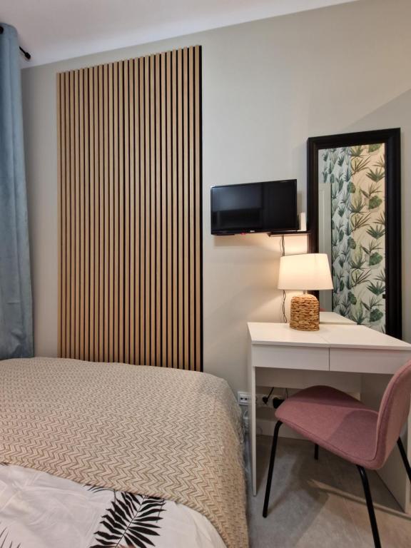 Posteľ alebo postele v izbe v ubytovaní City Center Studio Apartments