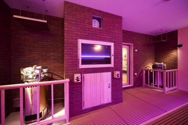 TV a/nebo společenská místnost v ubytování Sauna & Cabin Thermae-yu Nishiazabu