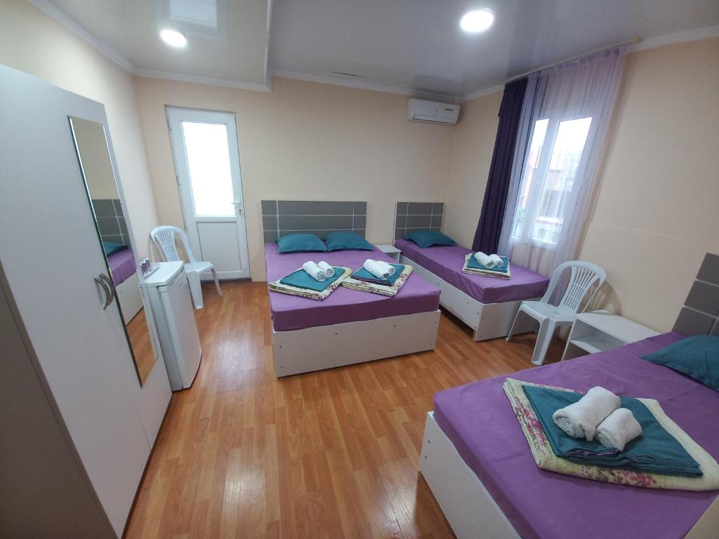 Postel nebo postele na pokoji v ubytování Imeri Hotel
