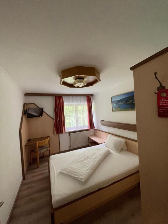 Postel nebo postele na pokoji v ubytování Hotel-Garni Seestrand