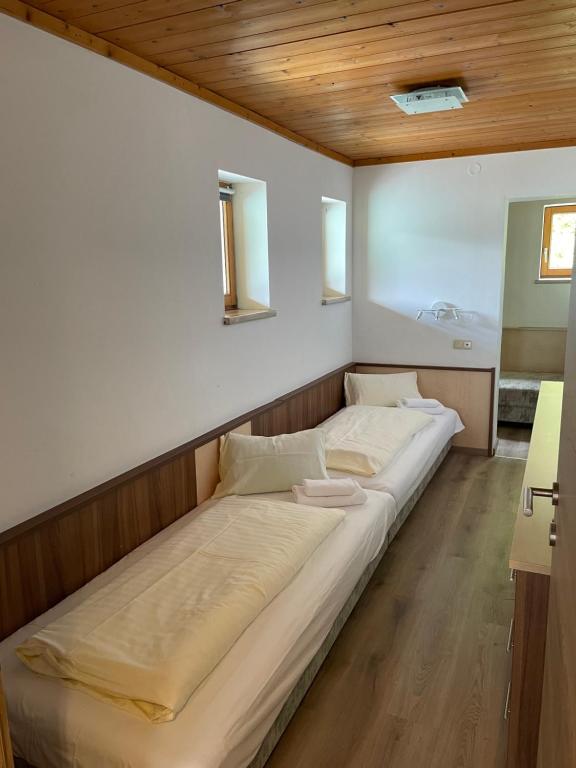 Postel nebo postele na pokoji v ubytování Hotel-Garni Seestrand