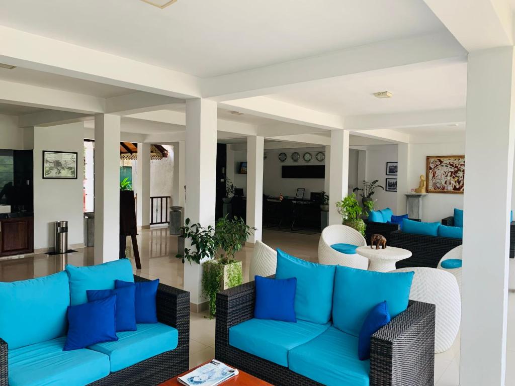 Posezení v ubytování Hotel Gangaaddara