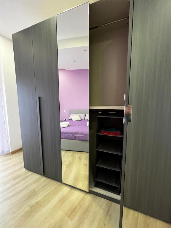 A bed or beds in a room at Renovated Loft with Vesuvio view terrace