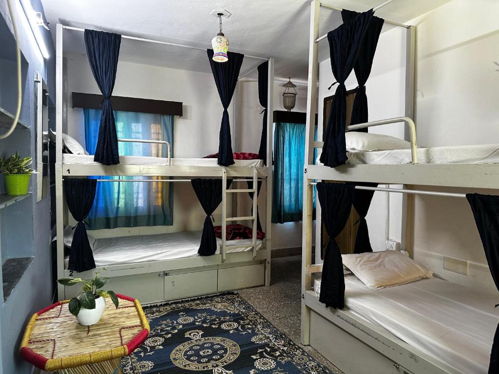 Postel nebo postele na pokoji v ubytování Dreamyard Udaipur