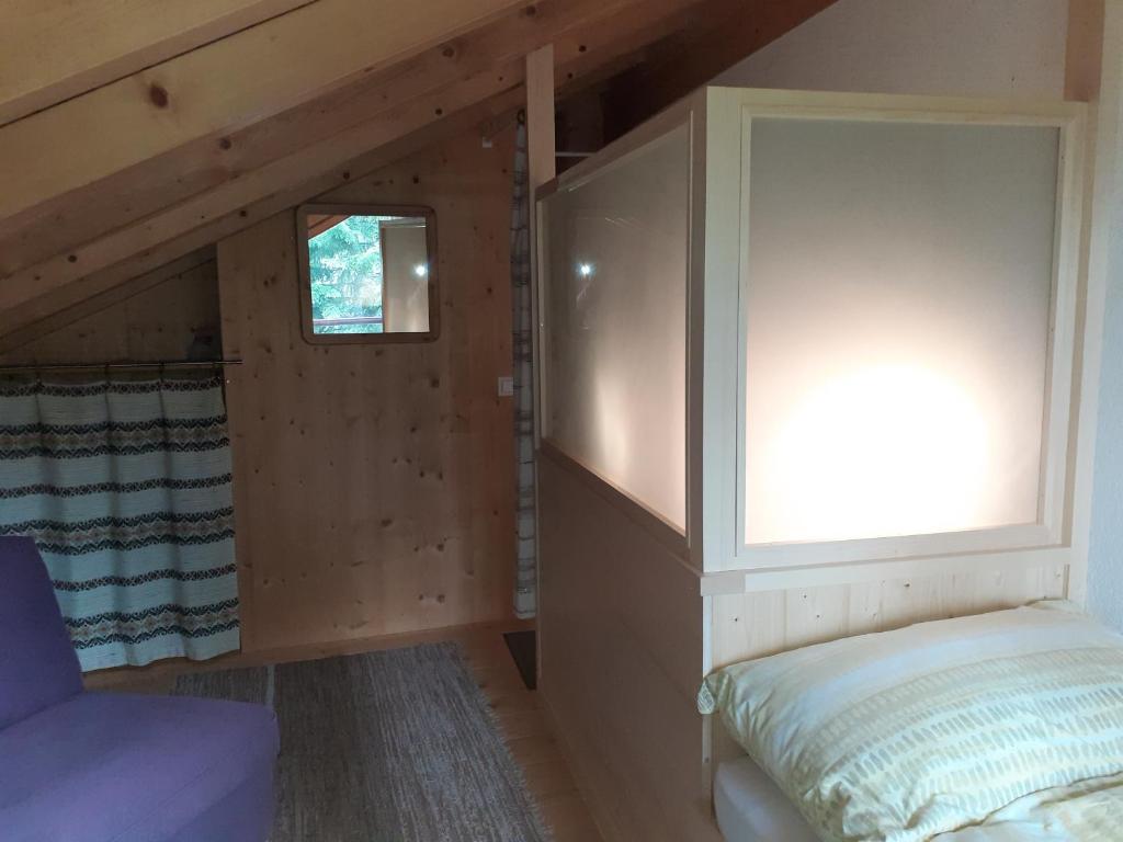 Postel nebo postele na pokoji v ubytování Les loulou 2