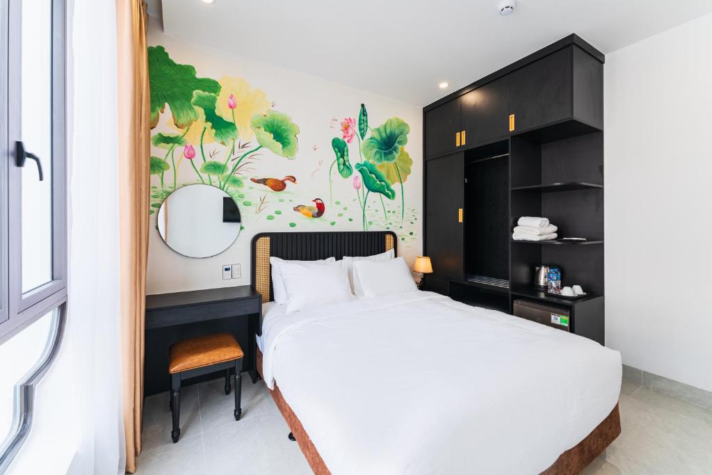 Giường trong phòng chung tại Q Boutique Hotel