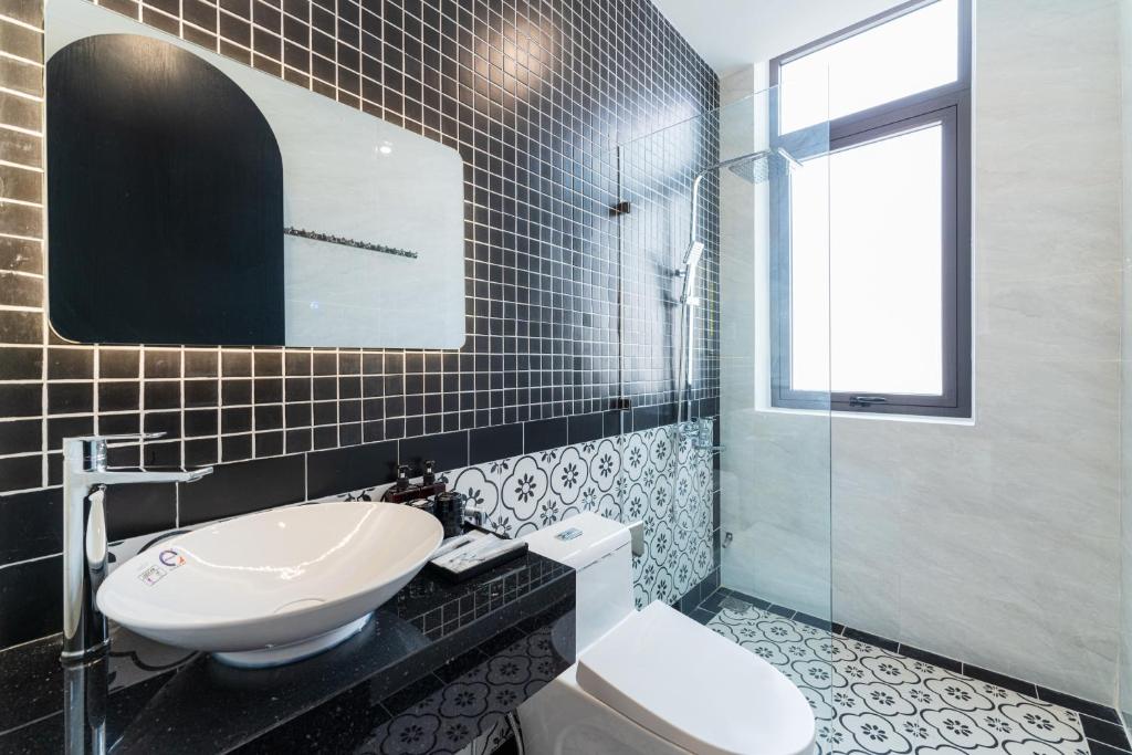Phòng tắm tại Q Boutique Hotel
