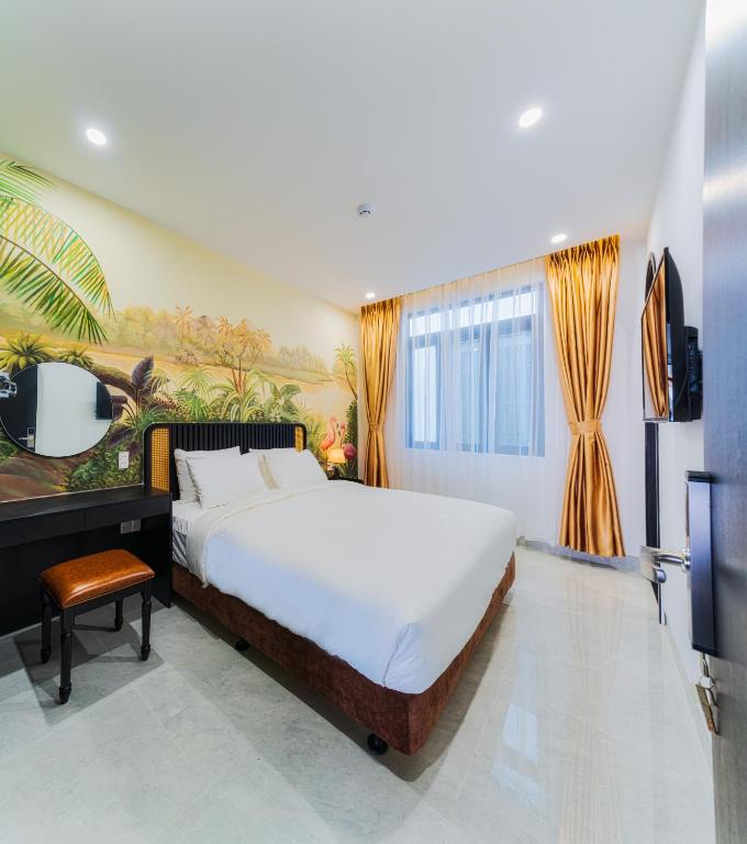 Giường trong phòng chung tại Q Boutique Hotel