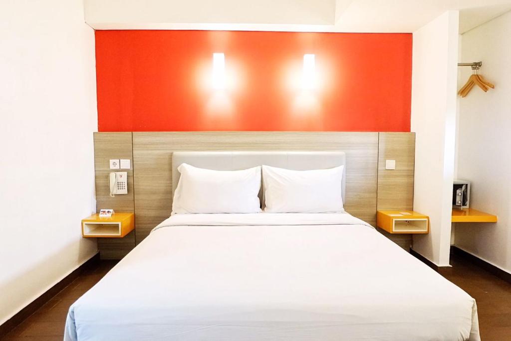 Postel nebo postele na pokoji v ubytování Amaris Hotel Thamrin City