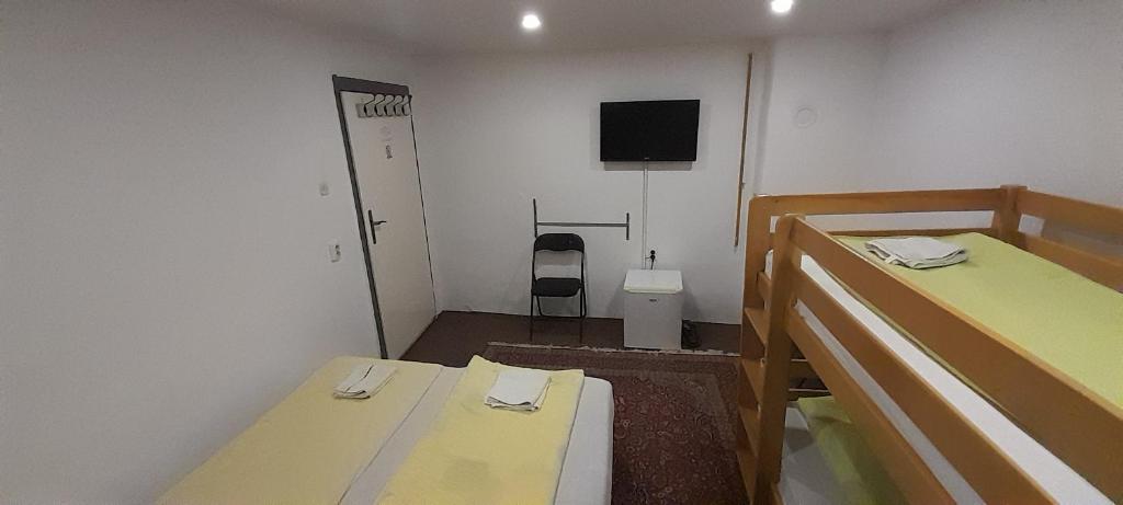 Krevet ili kreveti u jedinici u okviru objekta Mahala Apartments - Free Garage
