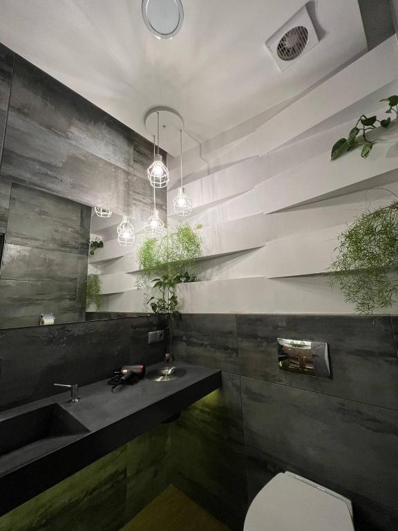 Ванна кімната в Blum Hotel