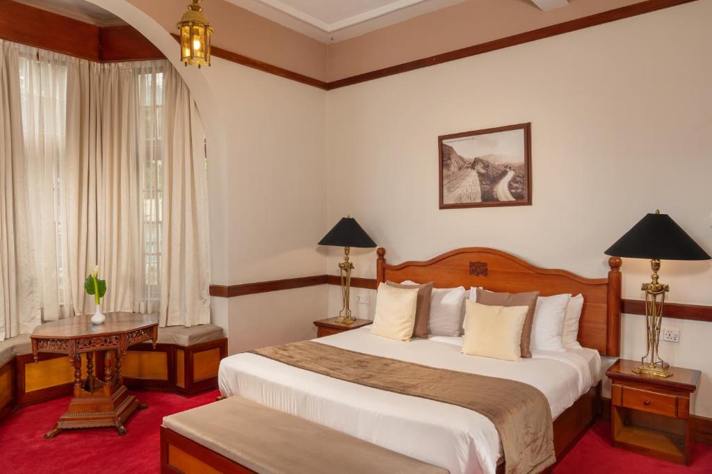 Voodi või voodid majutusasutuse The Grand Hotel - Heritage Grand toas