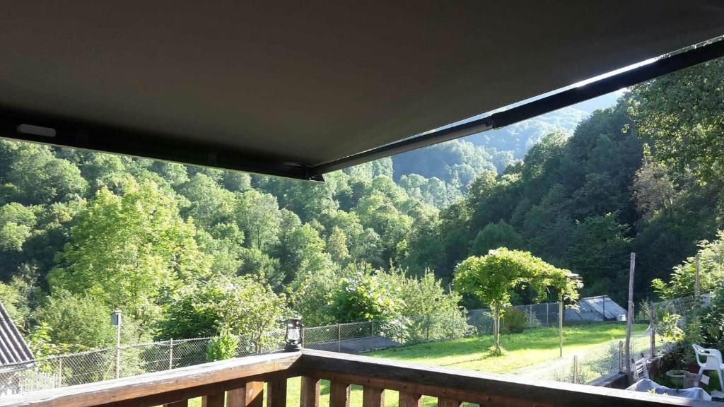 a balcony with a view of a mountain at Le chalet des nounours in Boutx