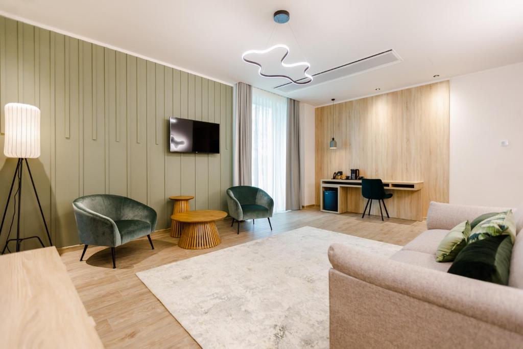 TV a/nebo společenská místnost v ubytování Amazonia Apartments