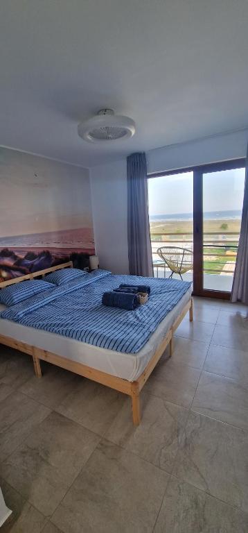 Кровать или кровати в номере SunScape Corbu