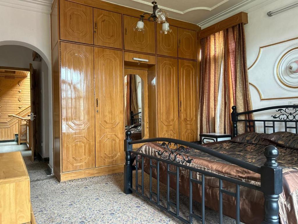 Postel nebo postele na pokoji v ubytování Taha Inn Home comfort