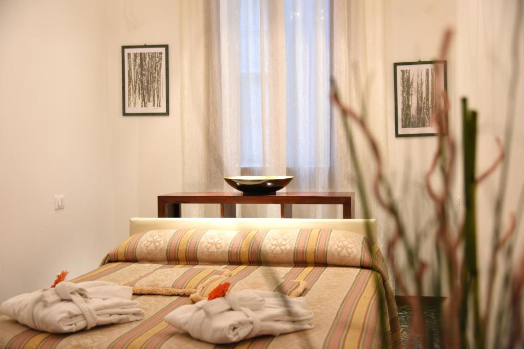 Posteľ alebo postele v izbe v ubytovaní Corte Coppo Superior Apartment