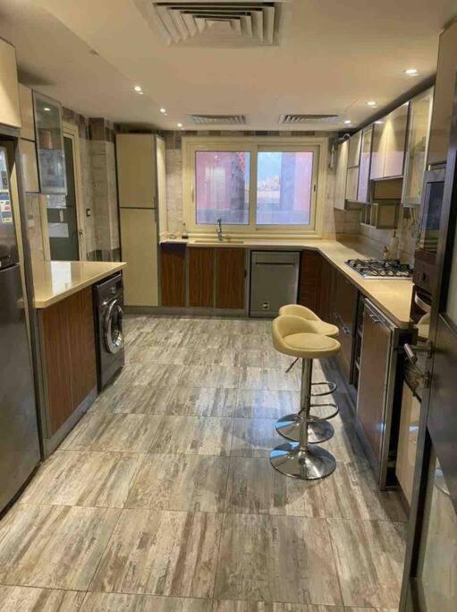 Kuchyň nebo kuchyňský kout v ubytování Jood Residences Apartment