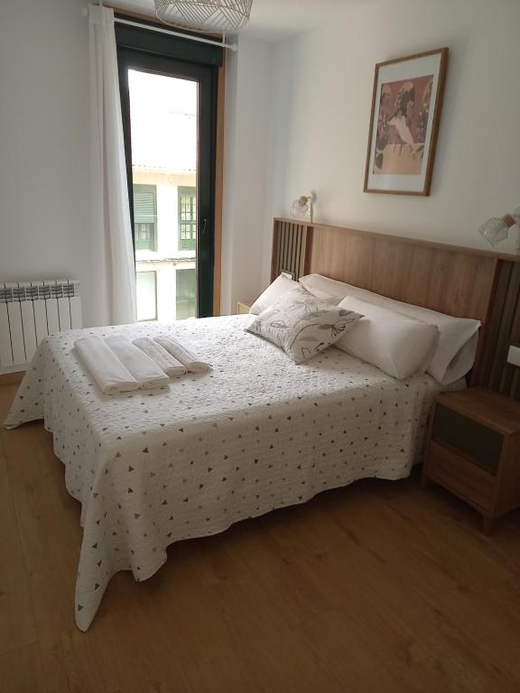 Postel nebo postele na pokoji v ubytování AMIZADE APARTAMENTO