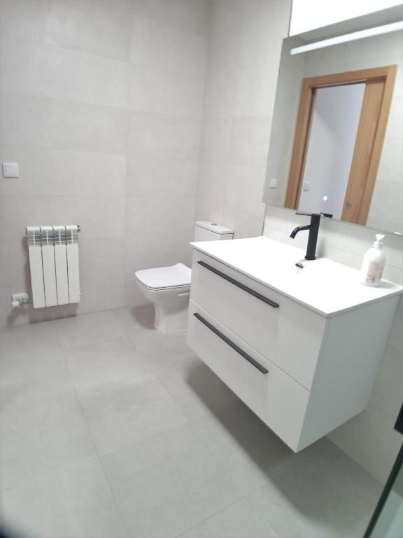 Koupelna v ubytování AMIZADE APARTAMENTO
