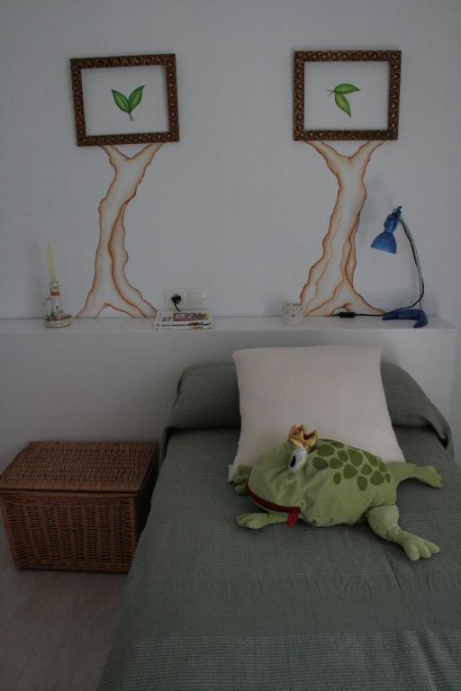 Posteľ alebo postele v izbe v ubytovaní Apartamentos La Casa Pintada