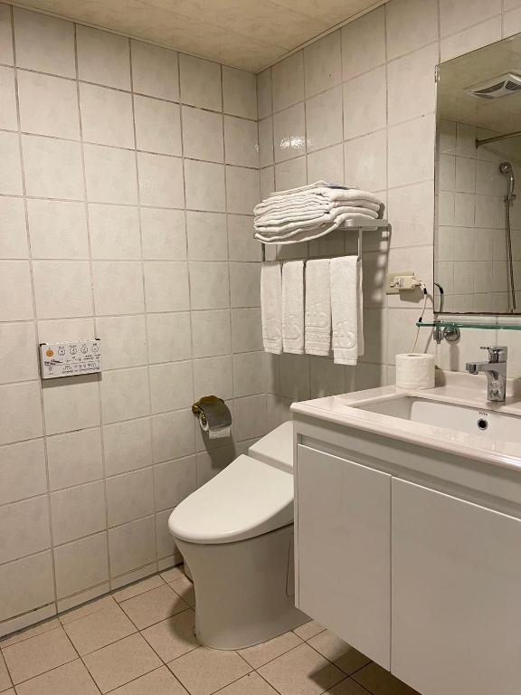 Koupelna v ubytování Dahshin Hotel