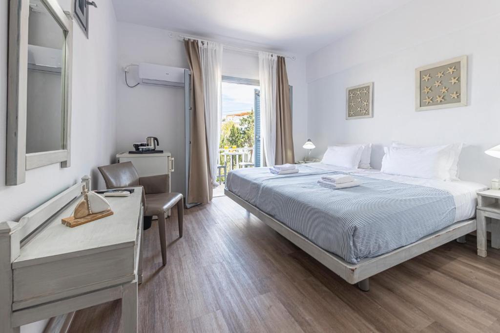 Postel nebo postele na pokoji v ubytování Hotel Manto