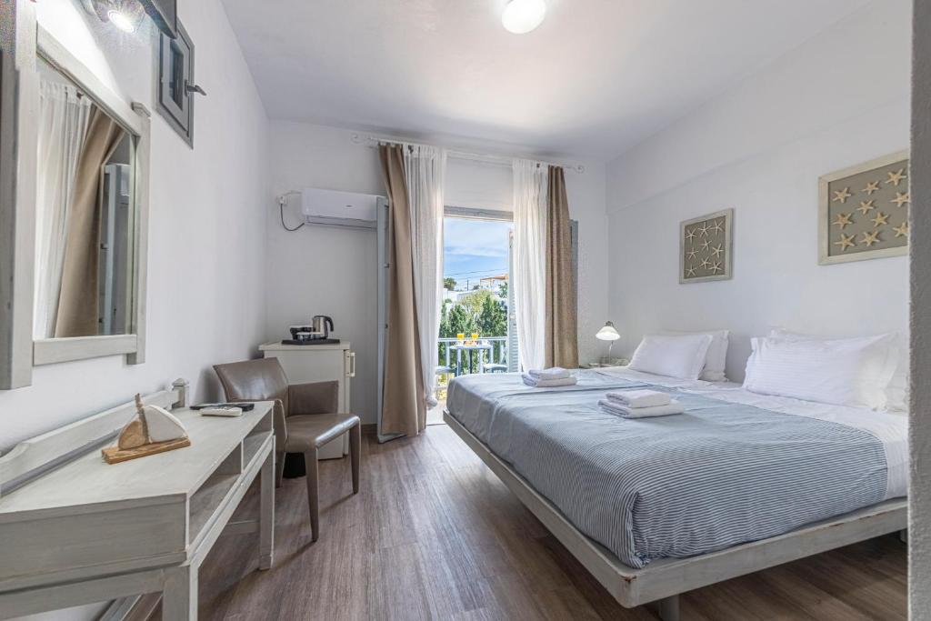 Postel nebo postele na pokoji v ubytování Hotel Manto