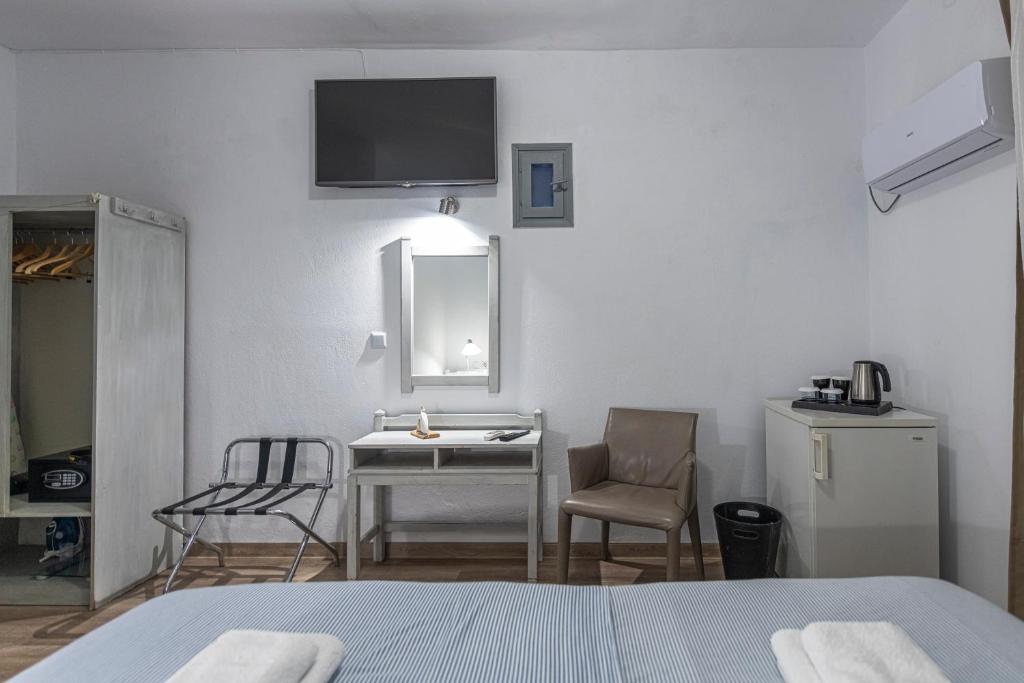 Postel nebo postele na pokoji v ubytování Hotel Manto