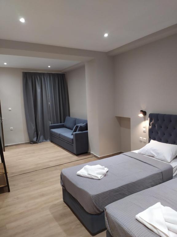 Postel nebo postele na pokoji v ubytování New Amaryllis Hotel