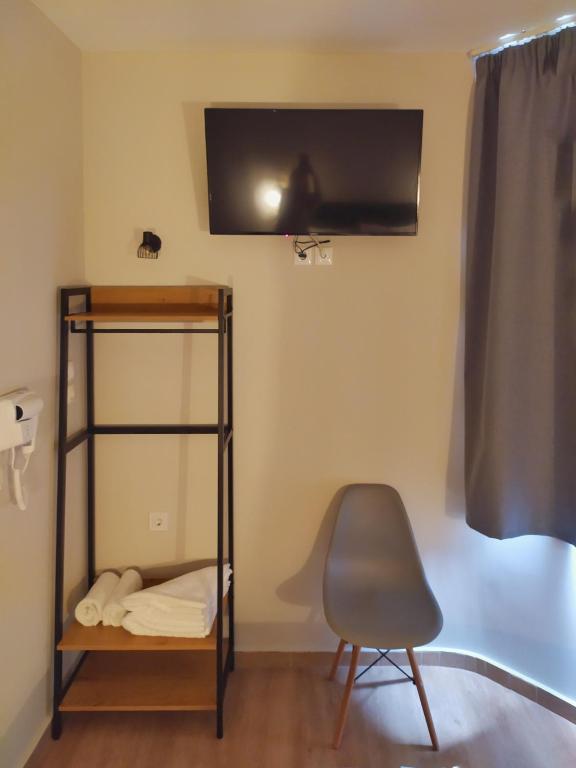 TV a/nebo společenská místnost v ubytování New Amaryllis Hotel
