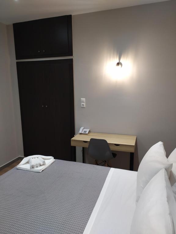 Postel nebo postele na pokoji v ubytování New Amaryllis Hotel
